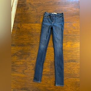 Hollister super skinny high rise. Dark jeans size 00L. W 23 inches L 33 inches.